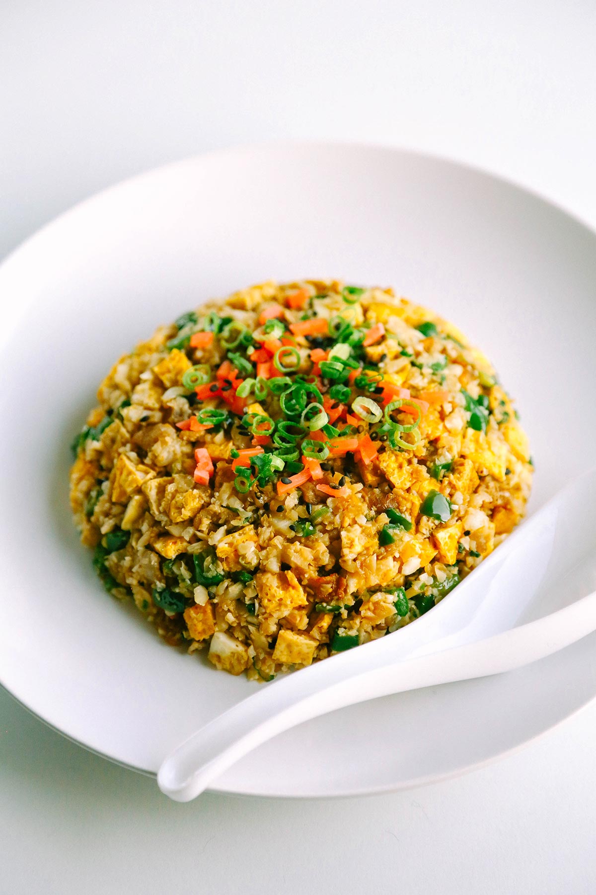 Keto fried rice for low carb. Easy chahan recipe using cauliflower rice and pork.